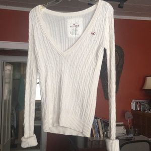 White ribbed sweatshirt with plunge V-neck